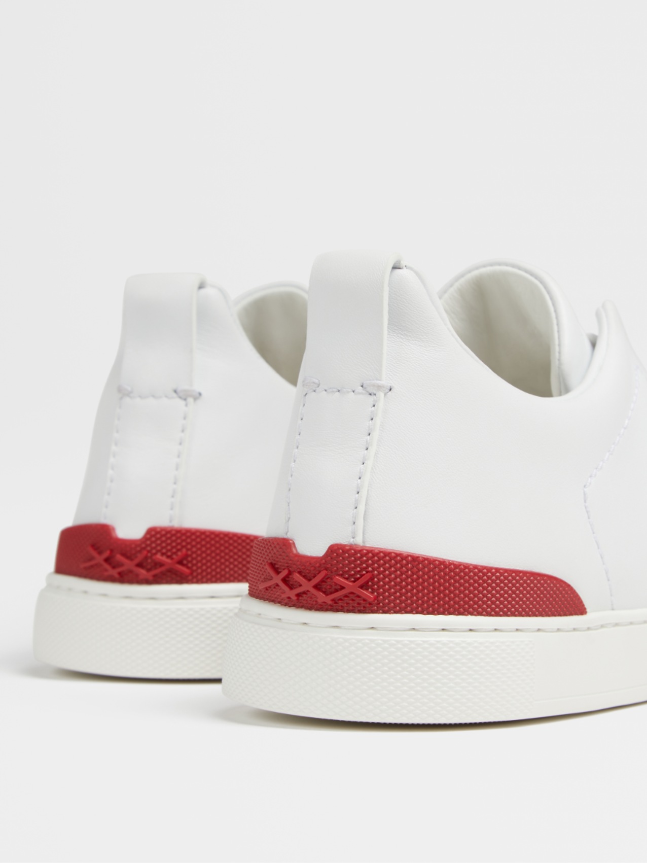 off white deerskin triple stitch sneakers