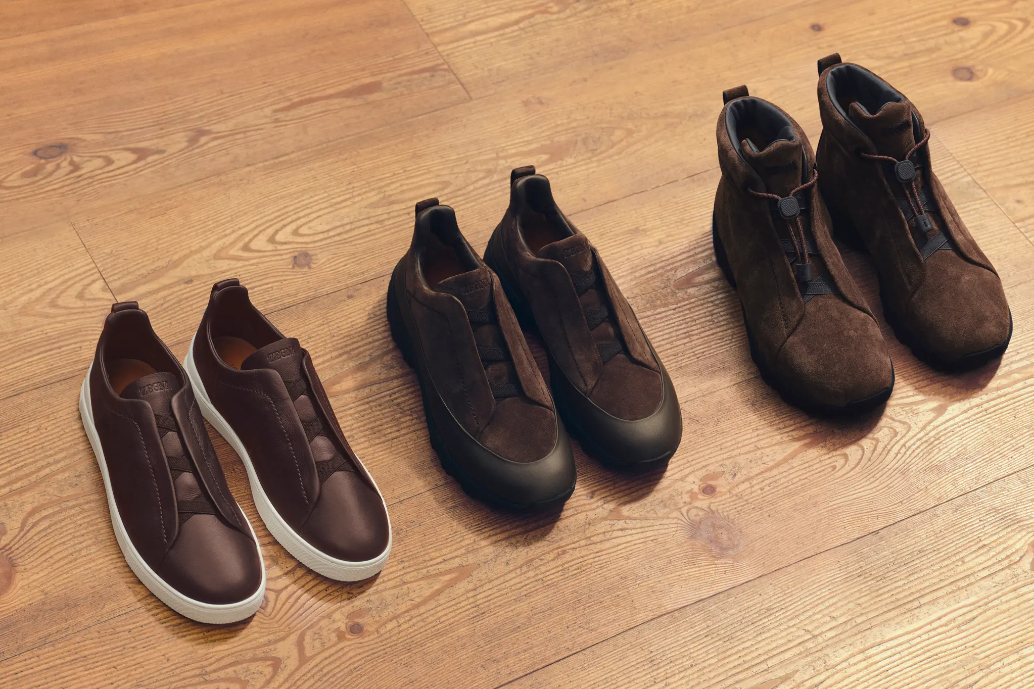 ZEGNA（杰尼亚）2025 年秋冬系列男士 Monte 运动鞋、Triple Stitch 运动鞋和 Vetta 靴子特写。