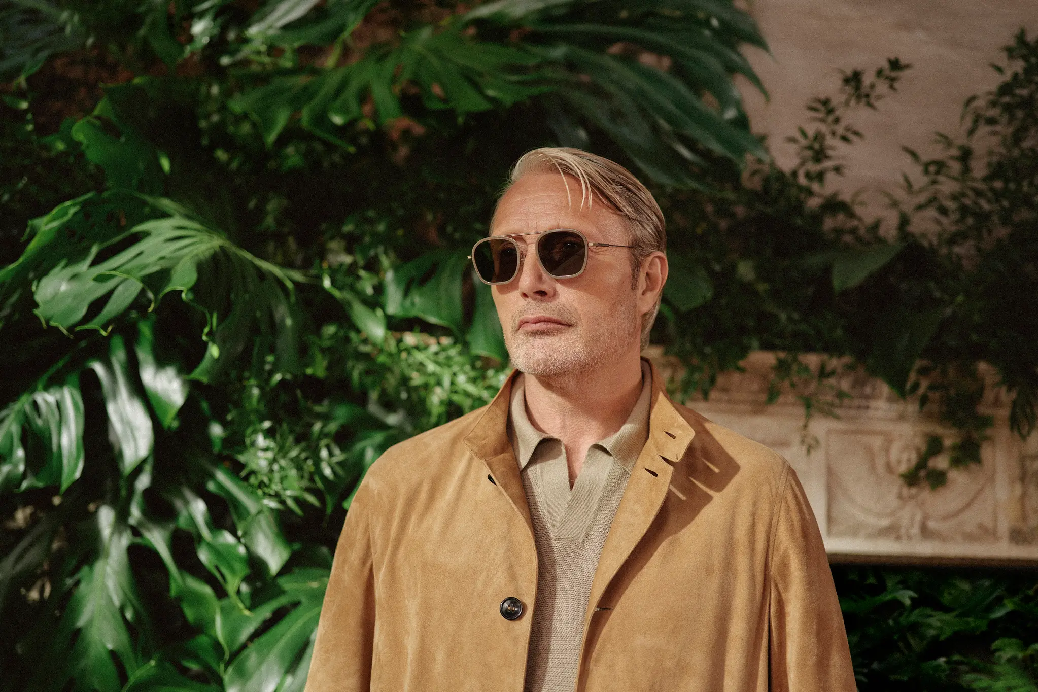 Mads Mikkelsen wearing the Conte Jacket in SECONDSKIN leather and ZEGNA sunglasses, part of the SS26 collection.