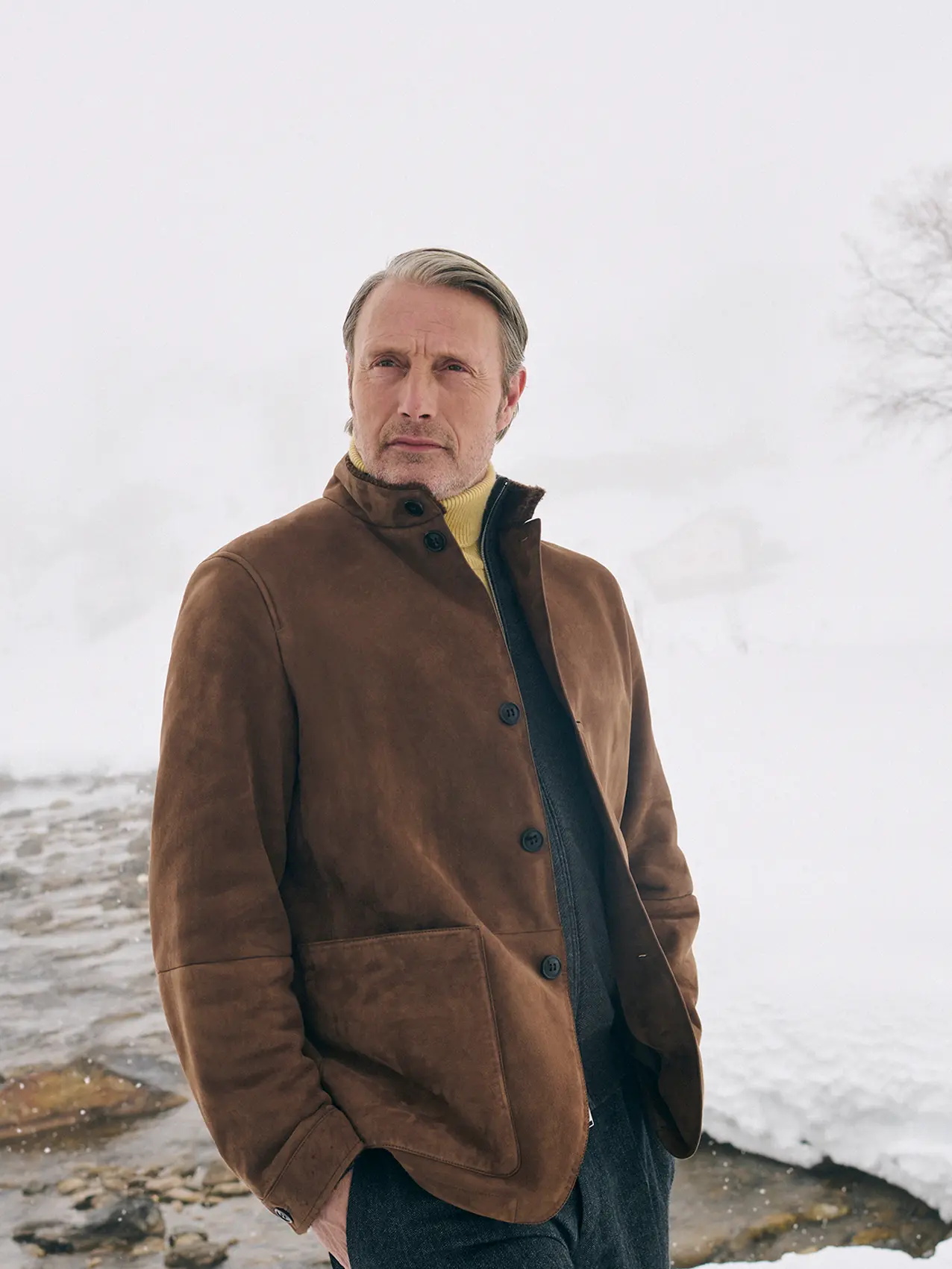 Mads Mikkelsen wearing a ZEGNA winter look featuring a Conte jacket.