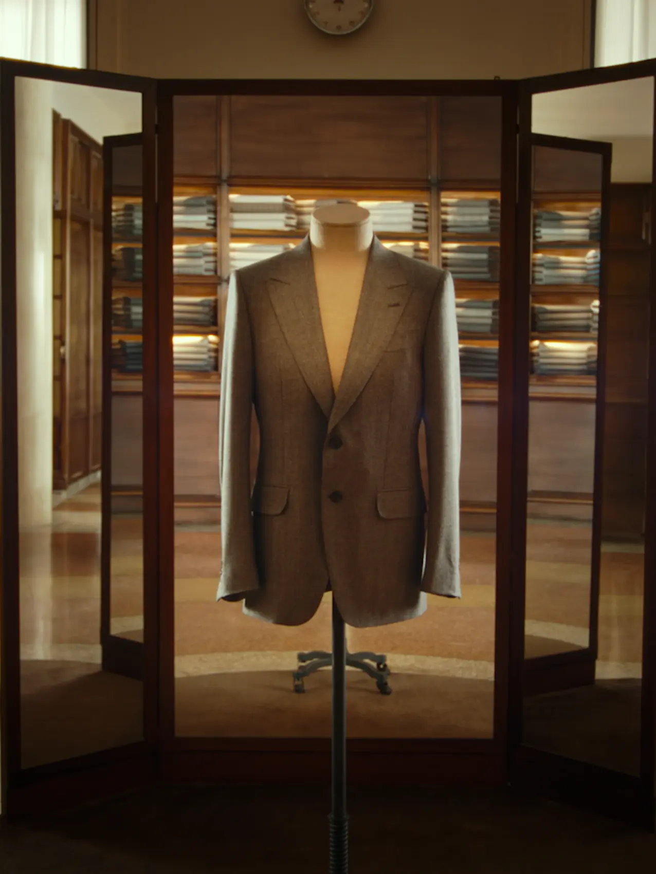 Tailored jacket displayed at a ZEGNA atelier.