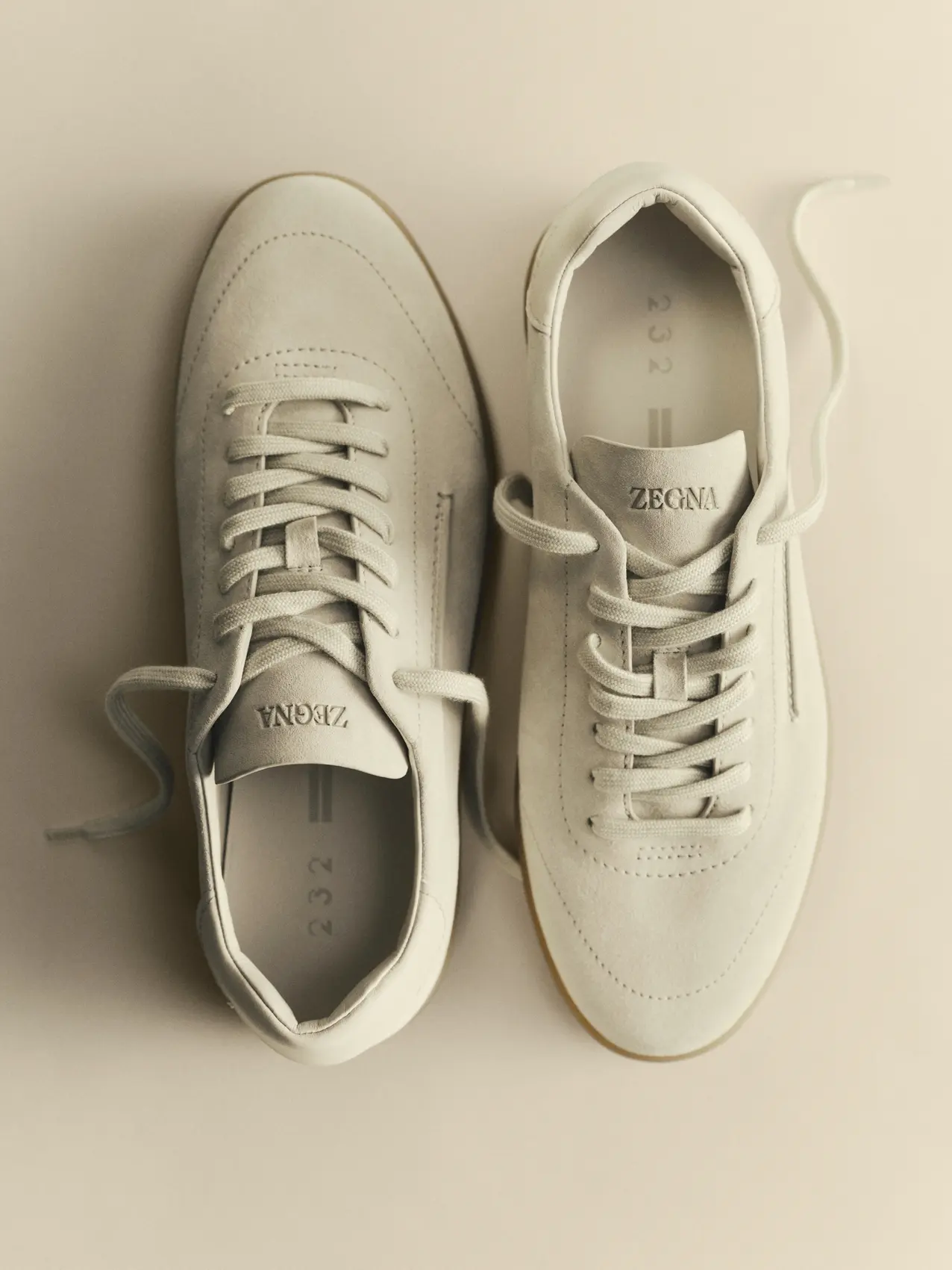 232 suede sneakers in the ZEGNA Bianco Oasi color, part of the Spring Summer 2026 collection.
