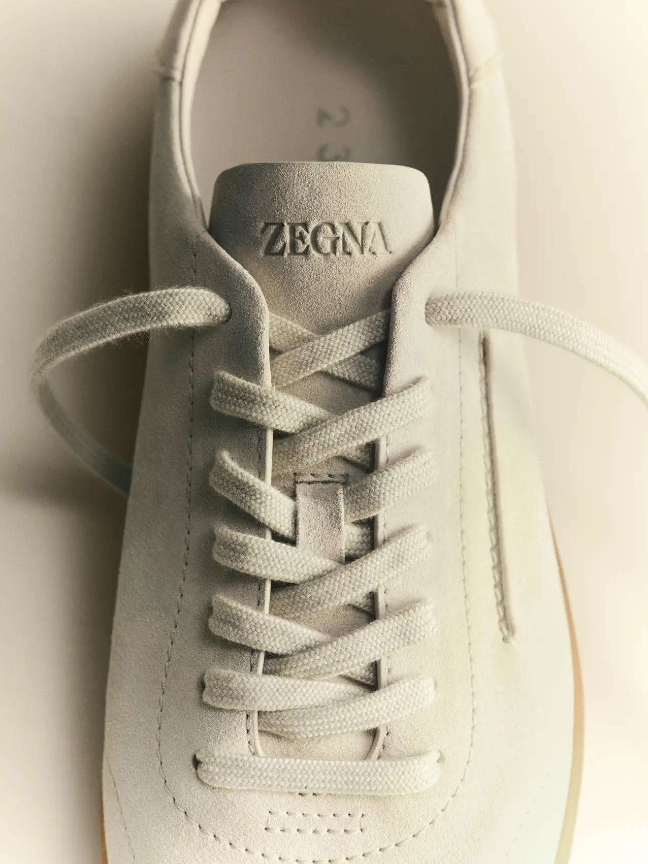 232 suede sneakers in the ZEGNA Bianco Oasi color, part of the Spring Summer 2026 collection.