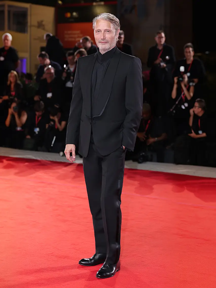 Mads Mikkelsen wearing a ZEGNA tuxedo on the red carpet at the Venice Film Festival 2025.