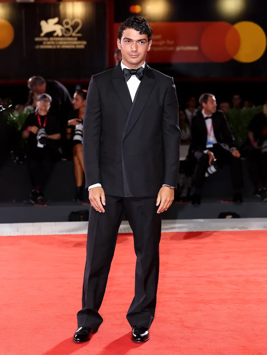 Giacomo Giorgio wearing a ZEGNA tuxedo on the red carpet at the Venice Film Festival 2025.