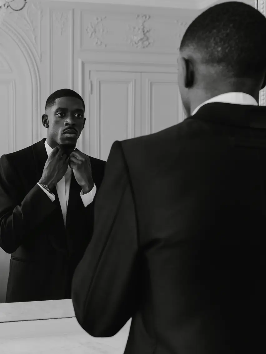 Ousmane Dembélé preparing for the Ballon d’Or ceremony in a custom-made ZEGNA tuxedo.