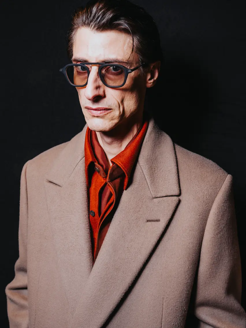 Man wearing a refined winter look from the ZEGNA Winter Fashion Show 2026.