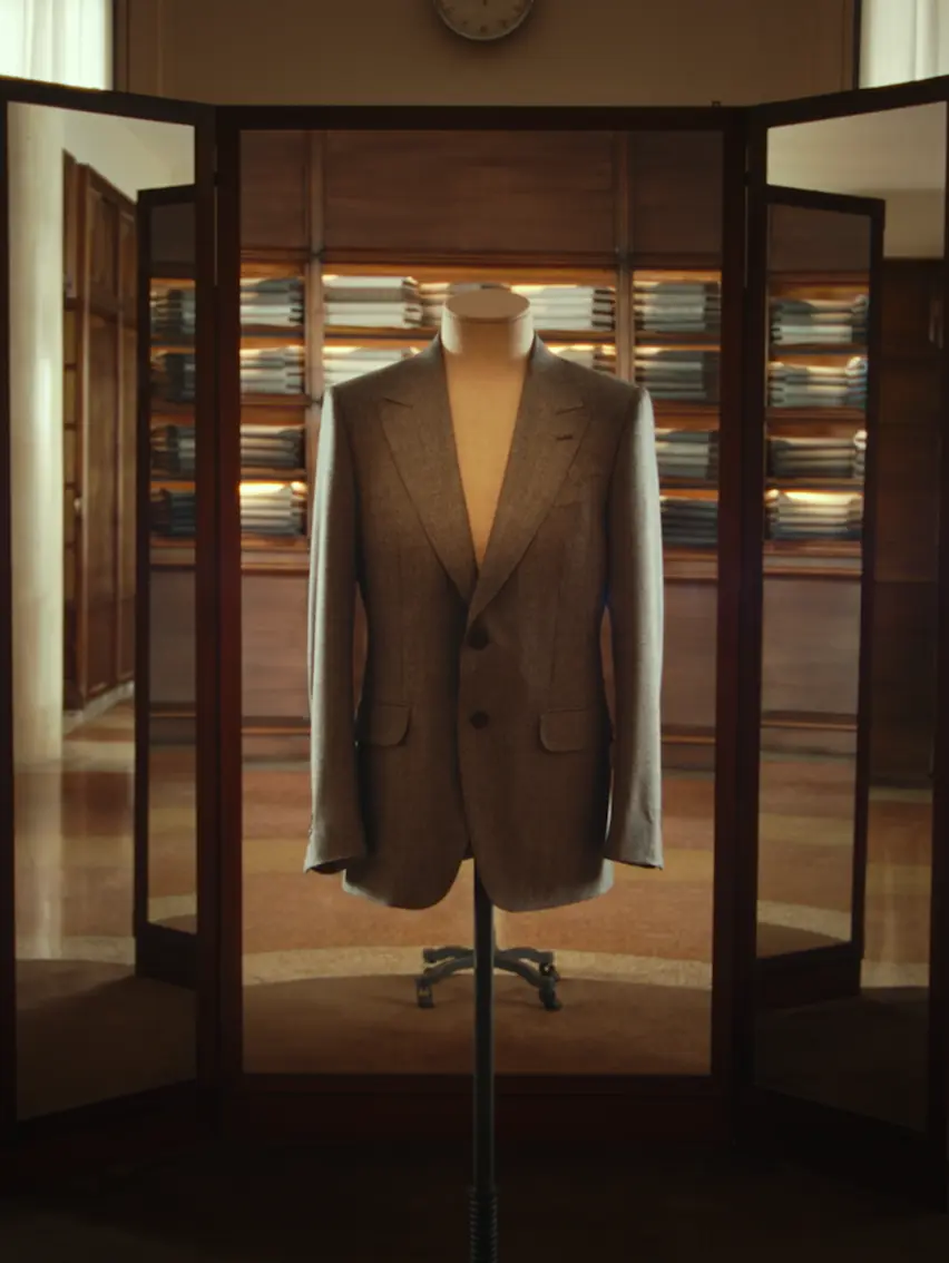 Tailored jacket displayed at a ZEGNA atelier.