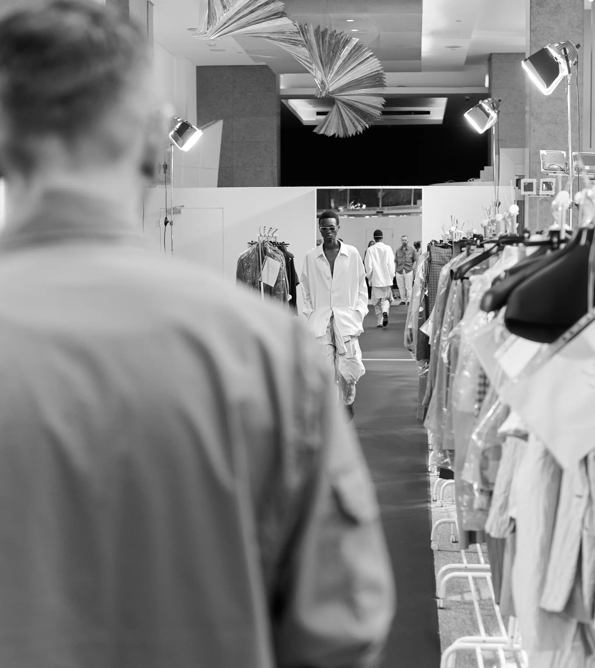 Models backstage preparing for the ZEGNA Summer 2026 Fashion Show.