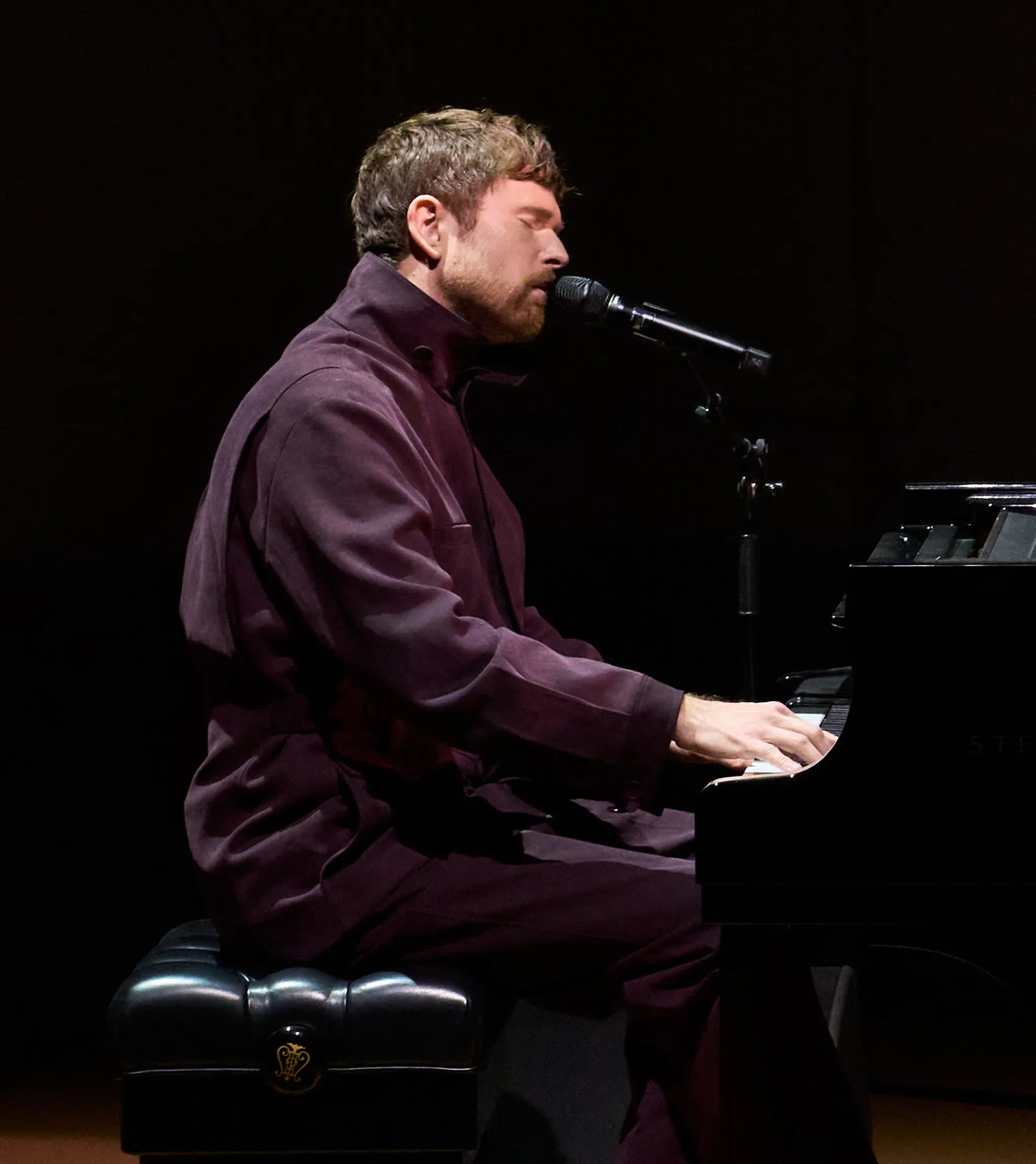 James Blake performing at the ZEGNA Summer 2026 Fashion Show.