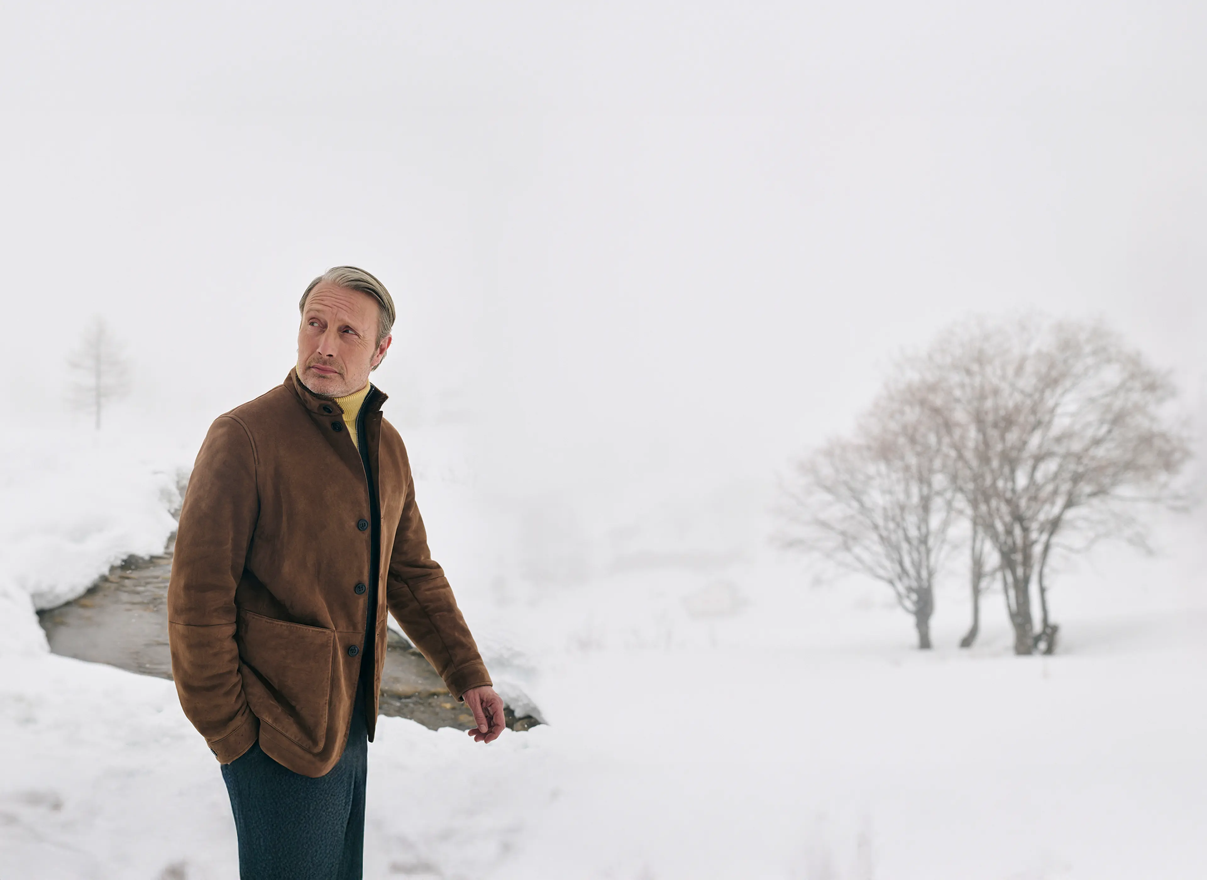Mads Mikkelsen wearing a ZEGNA winter look featuring a Conte jacket.