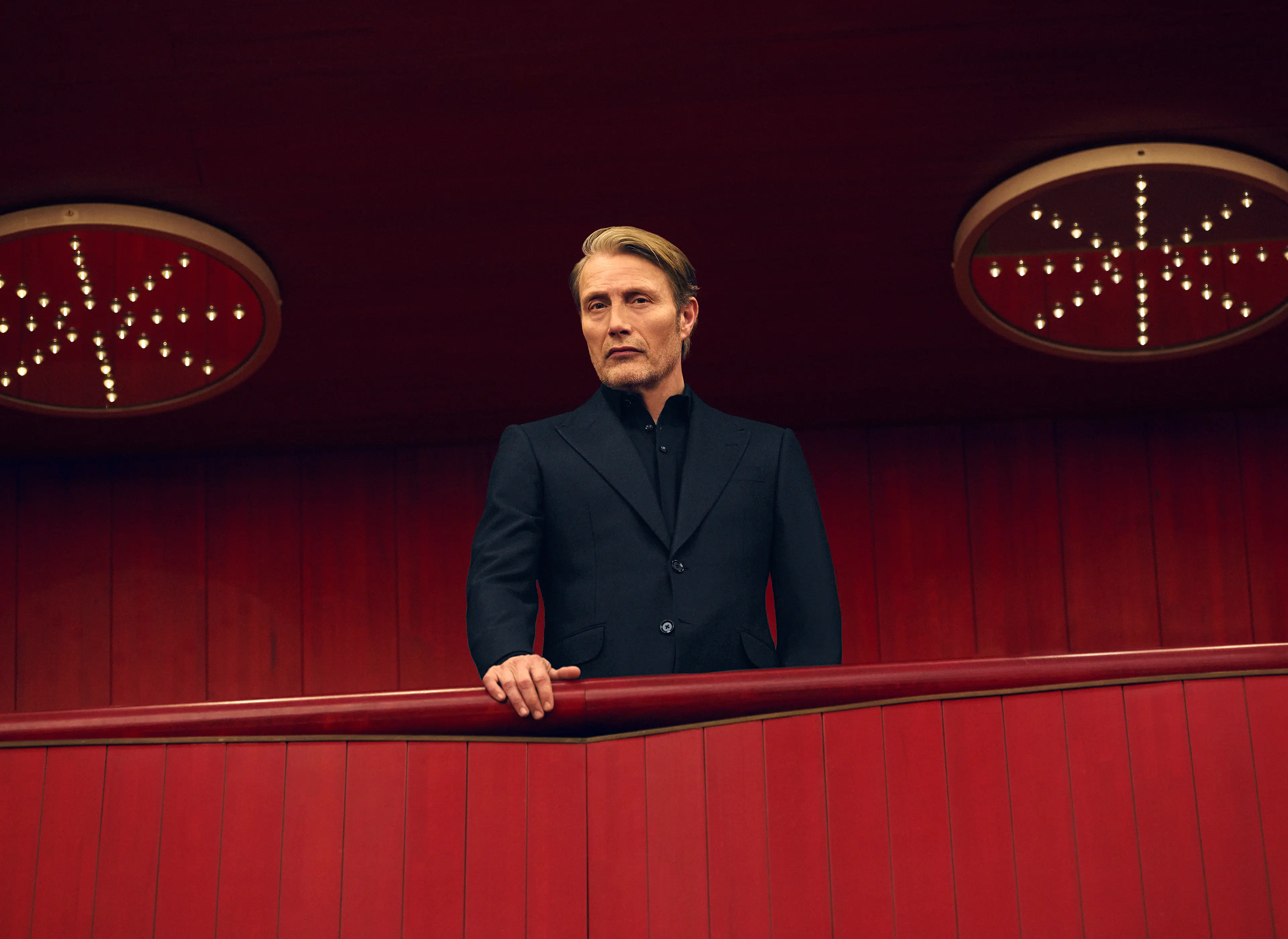 Mads Mikkelsen wearing a dark navy Torino style suit at Teatro Regio, from the ZEGNA Fall/Winter 2025 collection.