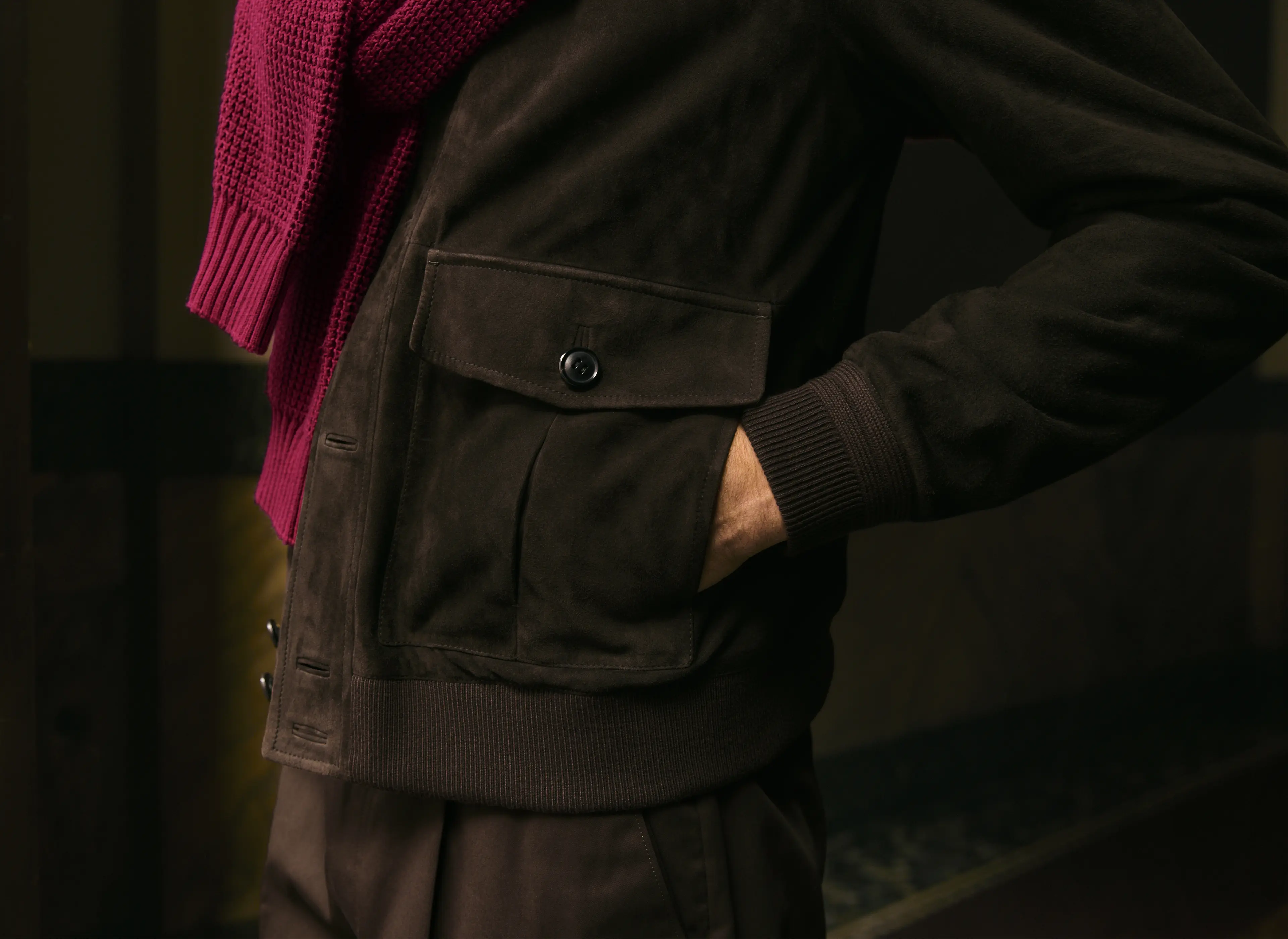 Close-up of a blouson with a ribbed stand collar and button closure, from ZEGNA SS26.