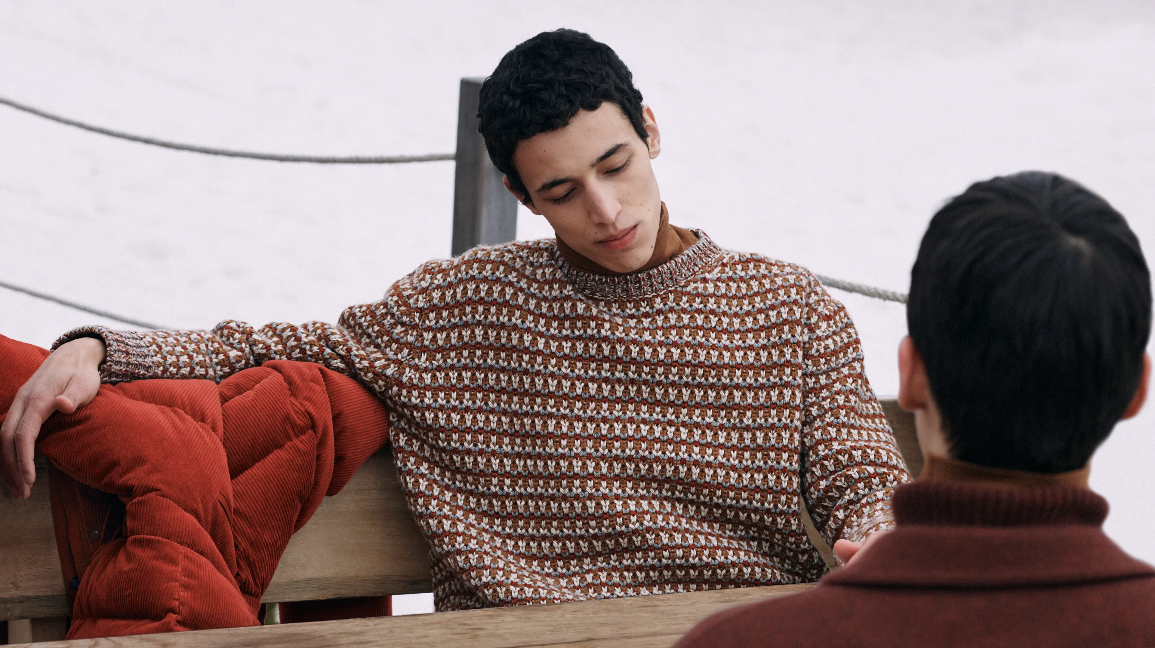 Two men wearing sweaters from the new ZEGNA collection.