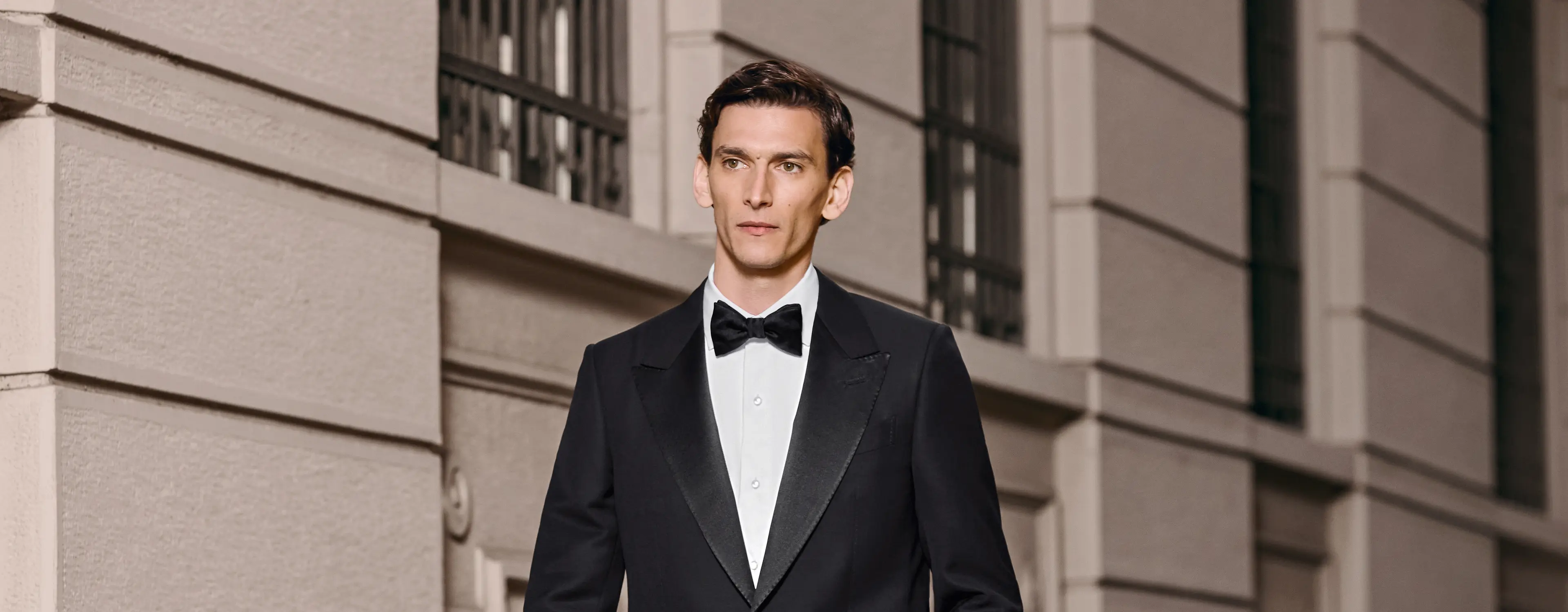 Man wearing an elegant tuxedo, from the ZEGNA FW25 collection.