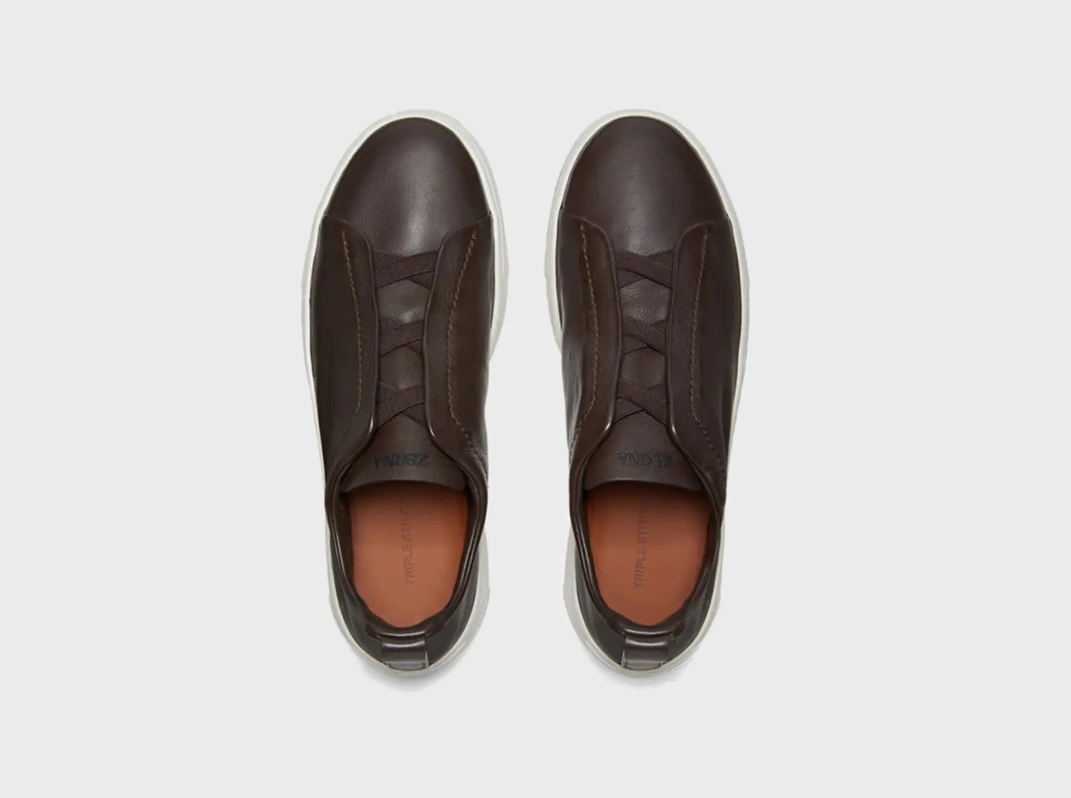 The SECONDSKIN Triple Stitch™ sneakers mold to your foot for the perfect fit.